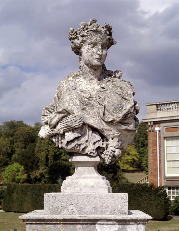 Detailed view of a statue in the forecourt at Wimpole Hall