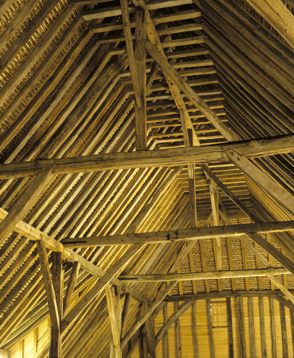 A view inside the Grange Barn at Coggeshall showing the rafters up in the roof