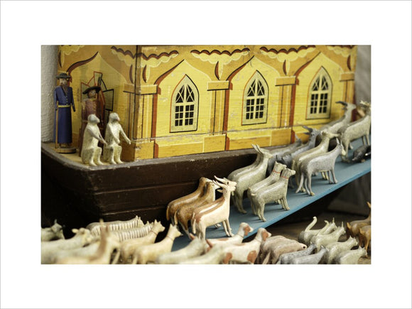 Close view of the wooden Noah's Ark with model animals made in the mid-C19th in the Black Forest area of Germany, collected by Charles Wade and displayed with other toys in Seventh Heaven, Snowshill Manor