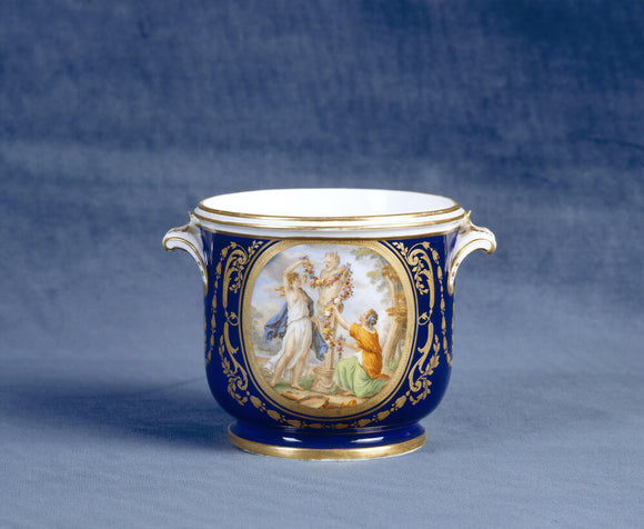 Close view of Sevres Wine Cooler,showing nymphs worshipping the bust of Pan, from a service made for Louis XVI, dated 1792, in the Porcelain Lobby at Upton House