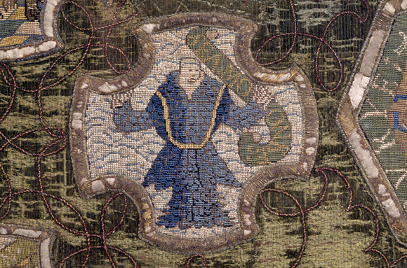 A sea creature in the form of a merman from the Marian Needlework at Oxburgh Hall