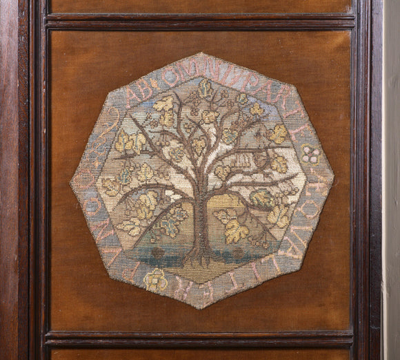 Octagonal canvas-work panel showing plants or herbs derived from sixteenth-century botanical plate books, at Hardwick Hall, Derbyshire