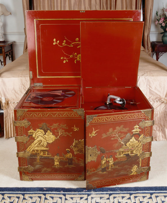 Close view of Chinese style red lacquer gramophone player, in the Bedroom at Upton House, with some 78rpm records