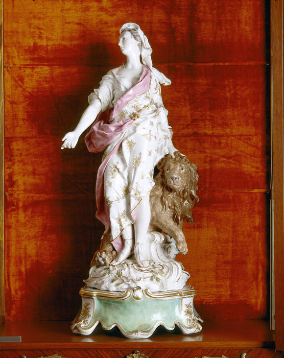 Close view of Chelsea porcelain figure of Una and the Lion, depicting Truth, a principal character in Spenser's allegorical poem The Faerie Queene, on the Landing at Upton House