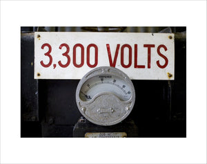 Close up of mining equipment - an electricty meter and volatge notice