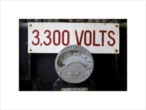 Close up of mining equipment - an electricty meter and volatge notice