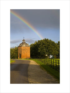 A rainbow above the eighteenth-century dovecote at Erddig, Wrexham, Wales