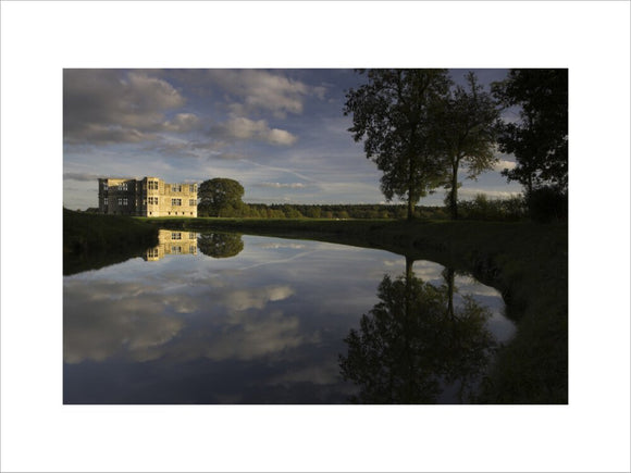 Glorious view from the west, across the moat, towards Lyveden New Bield near Oundle, Northamptonshire, with the West Wing central