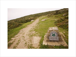 A pathway leading past The National Trust omega at St David's Head, Pembrokeshire