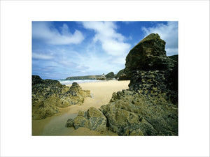 A sweep of the beach of Bedruthan Steps showing the rock stacks, home to hundreds of mussels