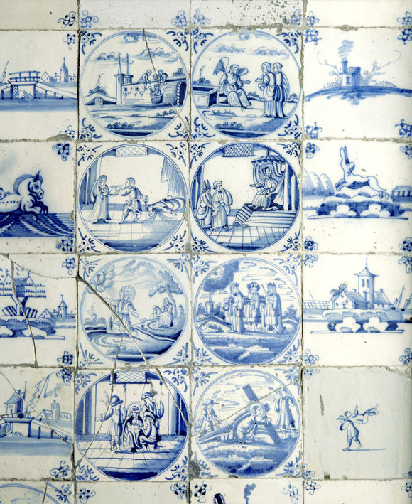 Close-up details of ceramic tiles in fireplace in the Great Parlour at Chastleton House
