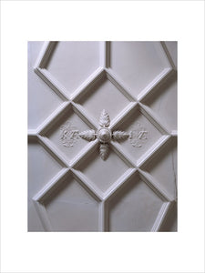 Detail of the plasterwork ceiling in the Hall at Trerice showing an ornamental section decorated with the initials K.A.