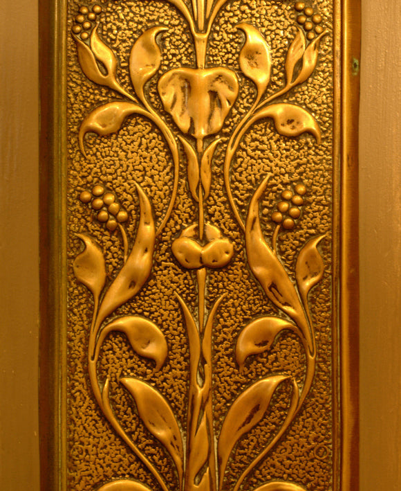 Metal cover or panel above the door handle on the door of the Grey Room at Snowshill Manor, home to collector Charles Wade