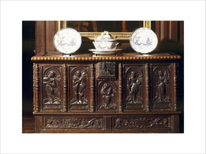 C19th chest in hall, incorporating Flemish carving C1600 at Antony House, Cornwall