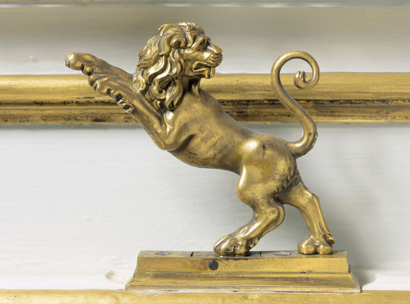 A close detail of the bell pull in the Red Drawing Room at Belton House in the shape of a rampant lion