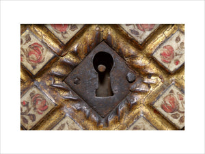 Close view of the lock of a decorated Spanish Vargueno cabinet, in the Grey Room at Snowshill Manor, home of collector Charles Wade