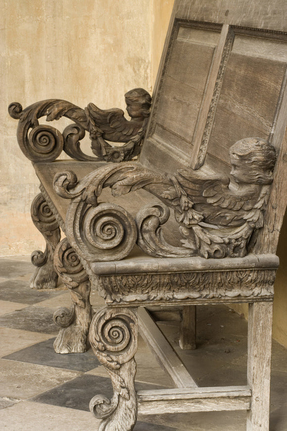 Elaborately carved wooden bench by Henry Harlow in 1674 at the North front of Ham House, Surrey
