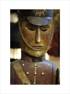 The face of a wind toy of a soldier, part of the Charles Wade collection of toys in Seventh Heaven at Snowshill Manor