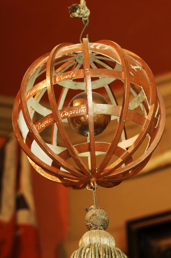 An armillary sphere designed by Charles Wade and made by George Hart, a silversmith of Chipping Campden