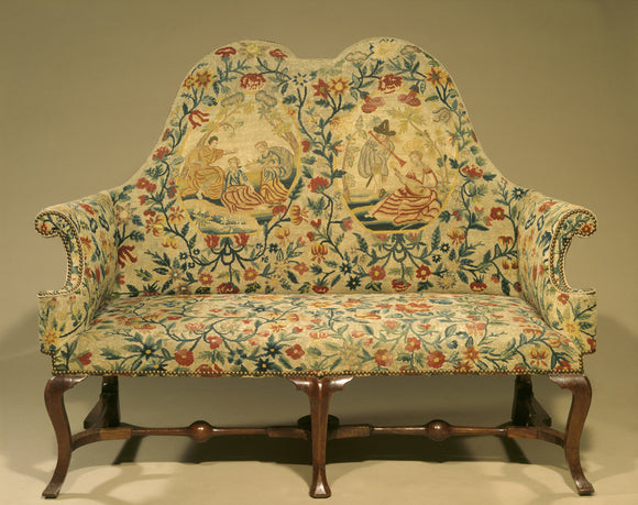 Early C18th walnut settee with needlework upholstery at Canons Ashby in the Tapestry Room