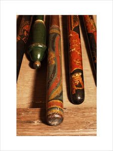 Close view of a collection of decorated truncheons, in the Lobby at Snowshill Manor, home of collector Charles Wade