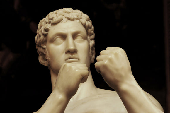 Close view of The British Pugilist sculpture (1828), also called Athleta Britannicus, by John Charles Felix Rossi (1762-1839) in the Gallery at Petworth House