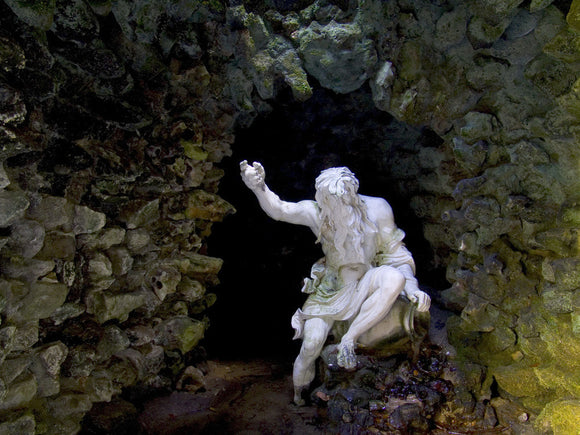 The classical river god statue, C18th, by Henry Cheere, in the Grotto at Stourhead, Wiltshire