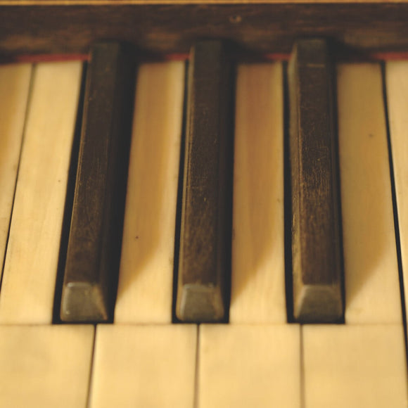 Close view of part of the Longman square piano c.1800 in the room known as Nadir at Snowshill Manor, Gloucestershire.
