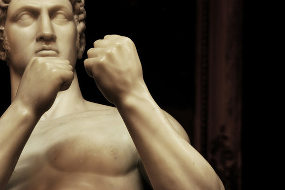 Close view of The British Pugilist sculpture (1828), also called Athleta Britannicus, by John Charles Felix Rossi (1762-1839) in the Gallery at Petworth House
