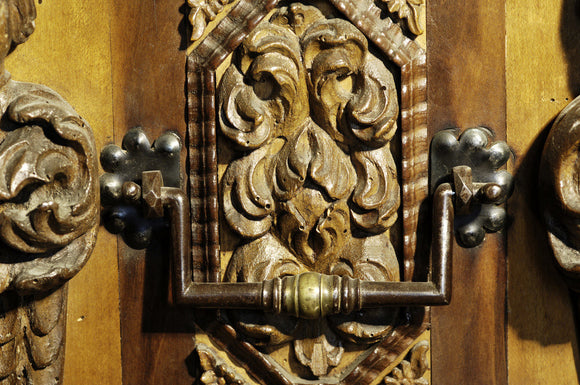 Detail of an Italian carved chest of 1698 in Ann's Room at Snowshill Manor