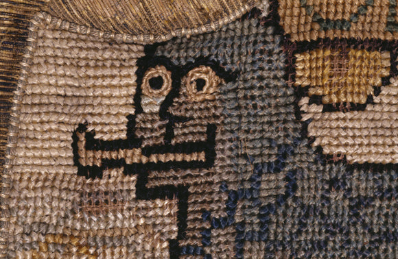 The head of 'A Lion of the Sea' from a motif on the Marian Needlework at Oxburgh Hall