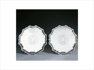 A pair of salvers by Peter Archambo, 1731/2, (DUN.S.469 a & b). Part of the silver collection at Dunham Massey, photographed for the Country House Silver book.