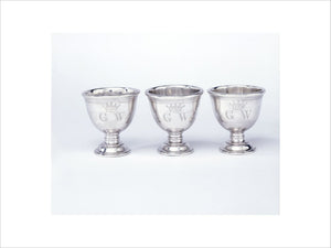 Three egg cups from a frame containing ten, by Peter Archambo, 1740/41