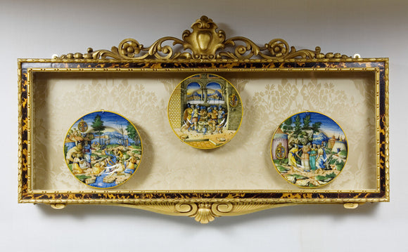 Framed Majolica plates depicting religious and classical scenes, in The Library at Ickworth, Suffolk