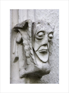 Grotesque face on east front of Bradley Manor, a medieval manor house at Newton Abbot, Devon