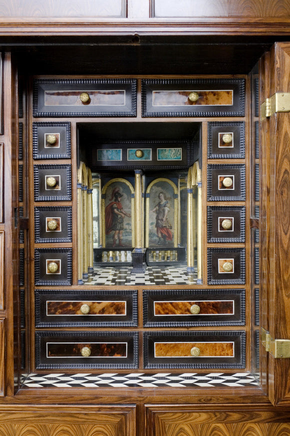 A detail of the late seventeenth-century, Anglo-Dutch, Mass Cabinet with a mirrored recess used by the Host during Mass, at Coughton Court, Warwickshire