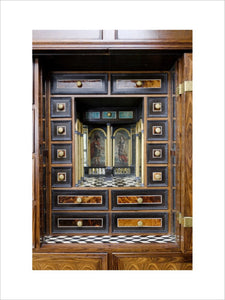 A detail of the late seventeenth-century, Anglo-Dutch, Mass Cabinet with a mirrored recess used by the Host during Mass, at Coughton Court, Warwickshire