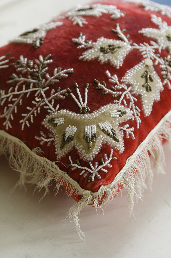 Red and white embroidered pin cushion in the South Bedroom at Hughenden Manor, Buckinghamshire, home of prime minister Benjamin Disraeli between 1848 and 1881