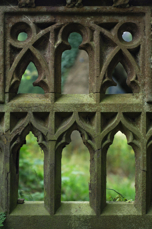 The elaborate tracery of a stone garden seat at Tyntesfield, Wraxall, North Somerset