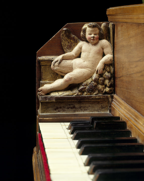 Carved cherub on keywell of 1590 (Anonymous) Italian harpsichord at Fenton House