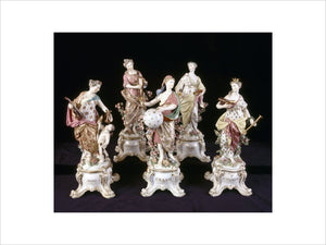 Close view of Chelsea Gold Anchor porcelain figures of five of the nine Muses, c 1765, in the Long Gallery at Upton House