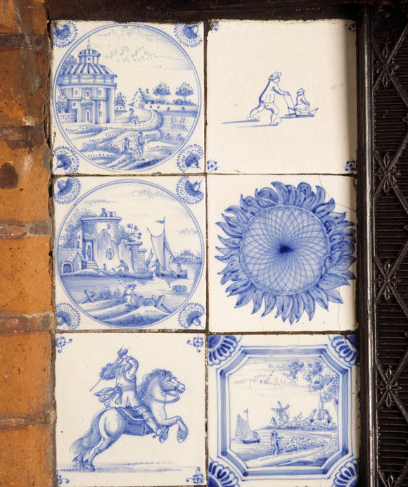Delftware blue and white tiles in the fireplace in the Dining Room at Red House