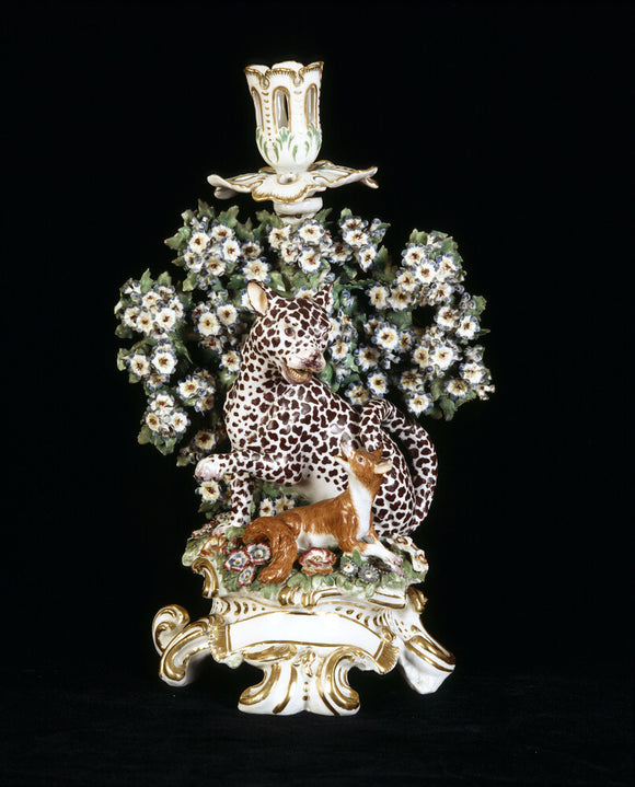 A close view of a Chelsea porcelain candlestick depicting the Leopard and Fox from Aesops' Fables, c