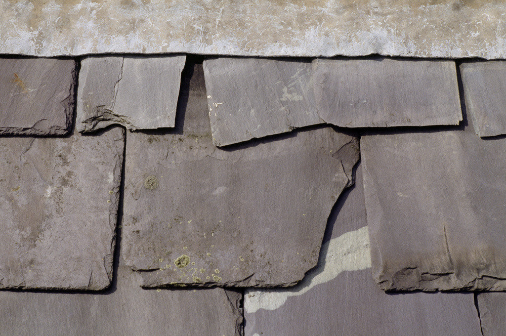 Slates Crimp A close up of old and broken slates in need of repair at Dudmaston Hal ...