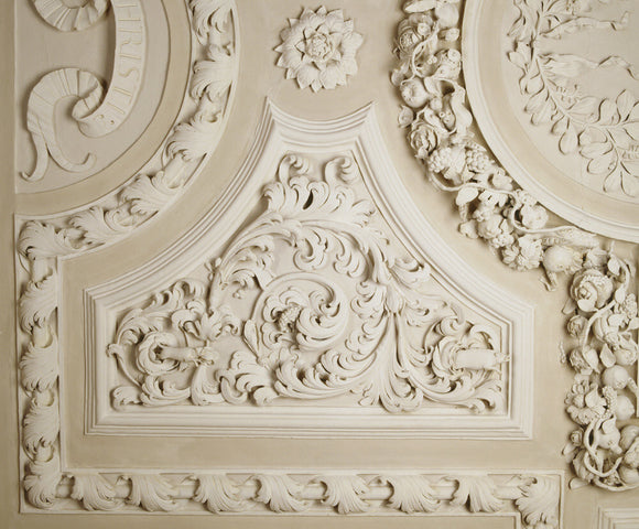 Close view of curlicue plasterwork on the dining room ceiling at Dunster Castle, installed in 1861 by Colonel Francis Luttrell (1659-90) and his wife, Mary