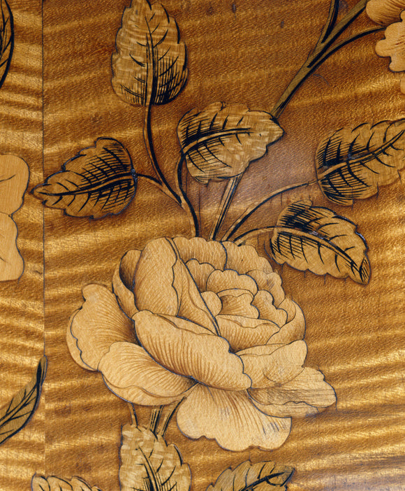 Rose inlay on 18th century commode at Nostell Priory