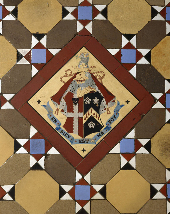 Detail of the Legh family coat of arms on the Minton floor tiles in the Orangery