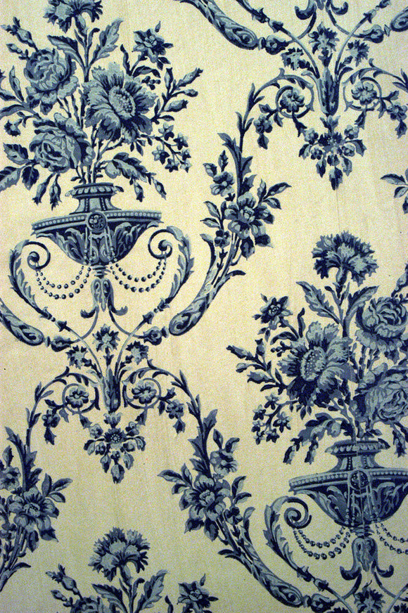 A detail of blue and white wallpaper, reproduced from the original C19th paper, in the Oak Hall at Petworth House