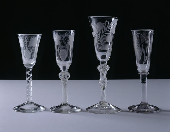 Part of the collection of C18th. drinking glasses displayed in the Dining Room