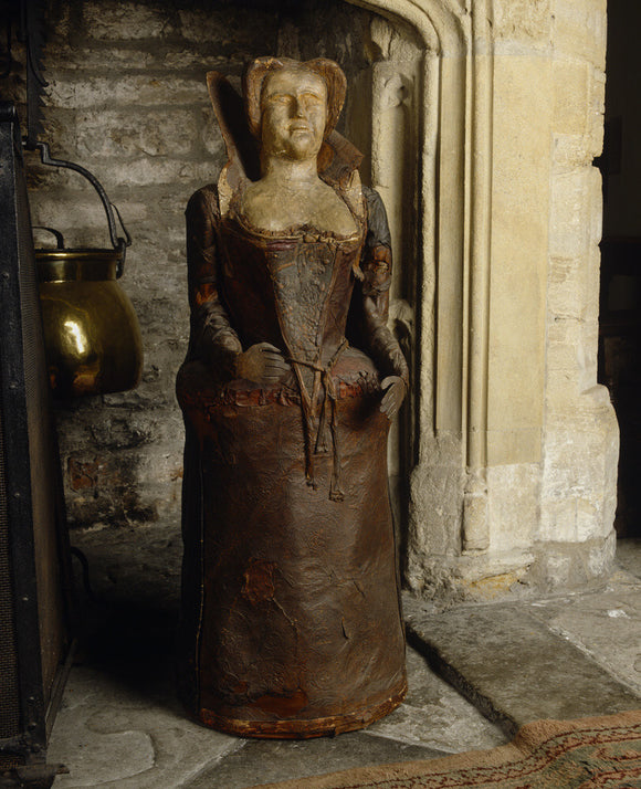 Detail of a leather lady, one of two on either side of the fireplace in the Great Hall at Lytes Cary, probably made in the C19th